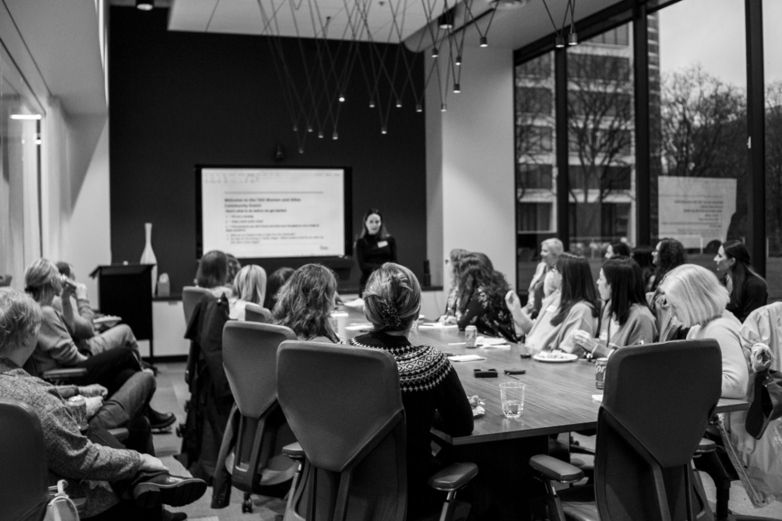 Women gathered in a roundtable discussion during a WAAC event.